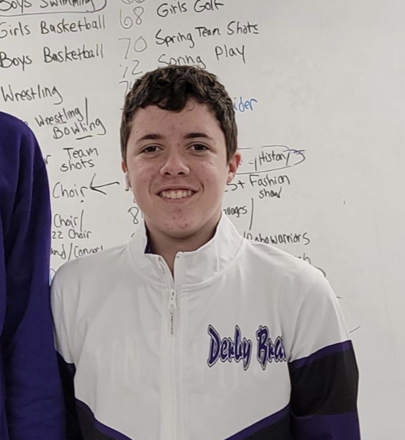 Norwalk High School student Gus Nurre, a member of the Des Moines Derby Brats, smiles in his Derby Brats jacket. Gus is spending his first season on the first team of the Derby Brats as the jammer. 