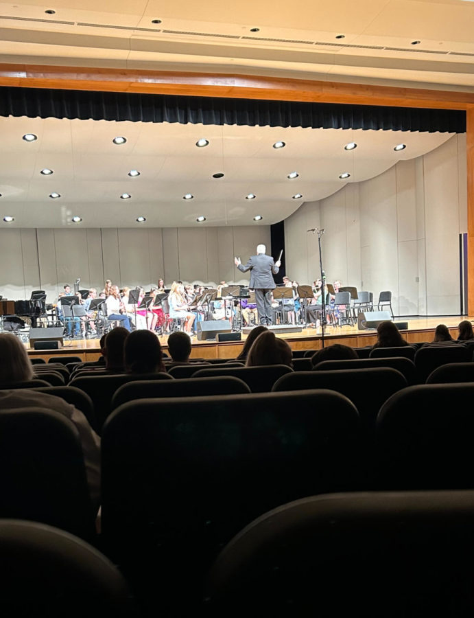 Band director Mr. Heltman directs one of the 6th grade band at the band concert on May 9th. This is the last concert he will direct before his retirement.
