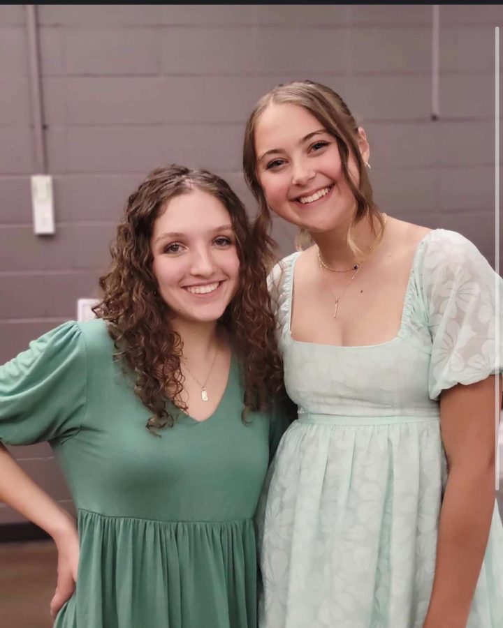 Audrey Adams(left) and Anya Kallenbach take a photo at the choir awards in the cafeteria on May 11th. Anya and Audrey are both in choir and choir is one of the many activities that are represent by them.