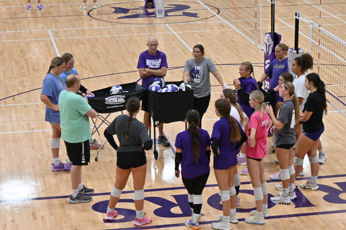 The Norwalk Varsity Volleyball Team breaks down their final huddle during practice on Friday, Sept. 15, in the NPECC. This is the NHS Varsity Team’s last practice before their upcoming game against Pella High School. 