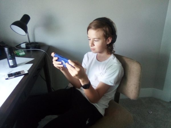 Seventh grader Kaden Sammons plays his Switch at his house on Saturday, Sept. 23. There is going to be a Super Smash Bros. tournament at the library on Friday, Sept. 29.
