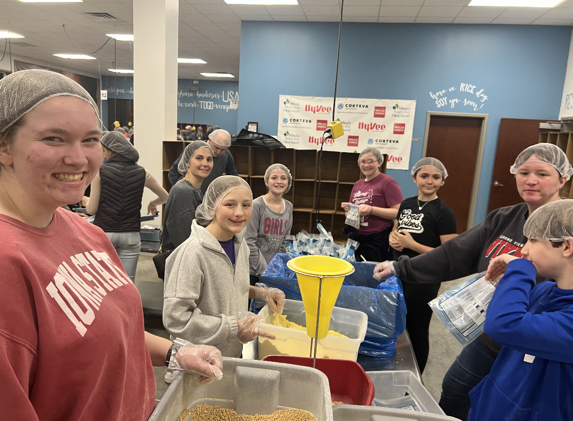 The Norwalk Christian Church youth group volunteers to package meals at Meals for the Heartland on March 1, 2023. Frantum said one way students can find ways to volunteer is through youth groups and activities.