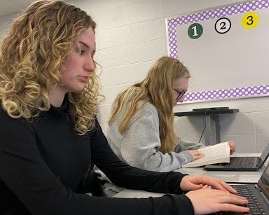Elin Lien, an NHS senior, types on her Chromebook in English 12 on Dec. 5. Lien is one of the early graduates of semester one 2023. 