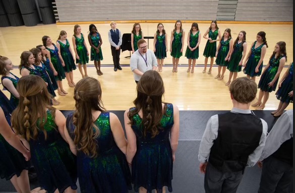 Norwalk High Schools JV show choir, Sound Adrenaline, warms up at the 2023 Norwalk Nexus show choir event on Sat. Feb. 4 at Norwalk High School. The group will perform again this year along with the varsity and middle school show choirs.