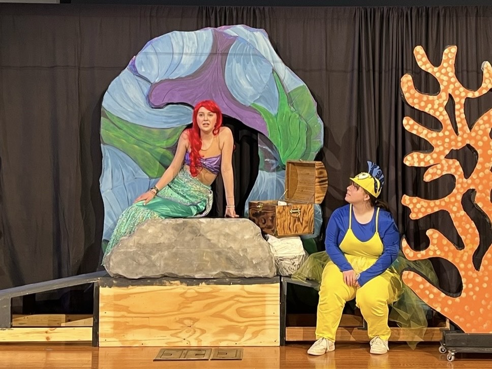 Anya Kallenback and Natalie Spencer as Ariel and Flounder in Part of Your World.