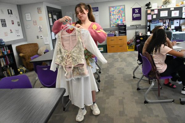 Sophomore Karlie Latterell finishes her clothing line in Fashion Arts class on Wednesday, April 17 in Mrs. Ashbacher’s room. Fashion students will present their own clothing lines for the Norwalk High School Fashion Show. 