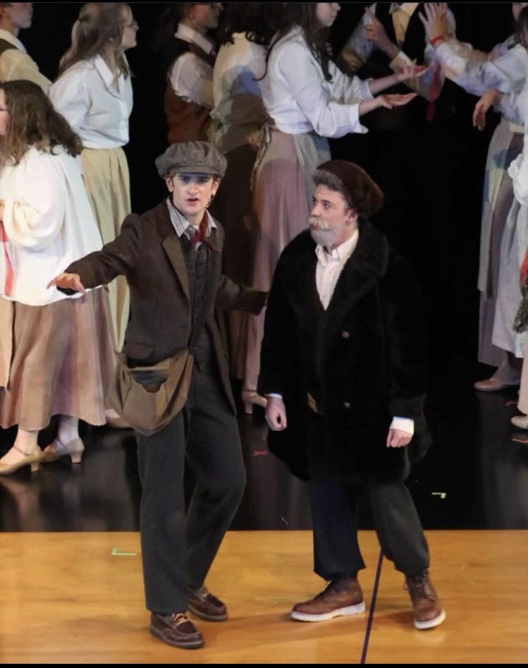 Noah Fox (left) and Vincent Martin open the shows on Friday, April 26th, at the Norwalk Performing Arts Center. Fox and Martin are both seniors who played lead roles in Anastasia this year.