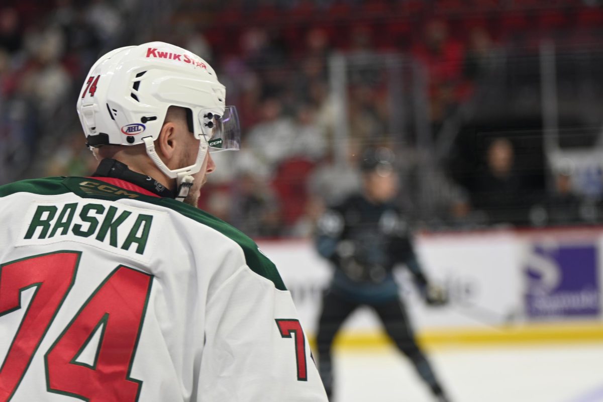 Iowa Wild forward Adam Raska looks for the puck against the Barracuda on Saturday, Nov. 2 at Wells Fargo Arena in Des Moines. The Wild secured their second straight win, with goalie Jesper Wallstedt winning the First Star.