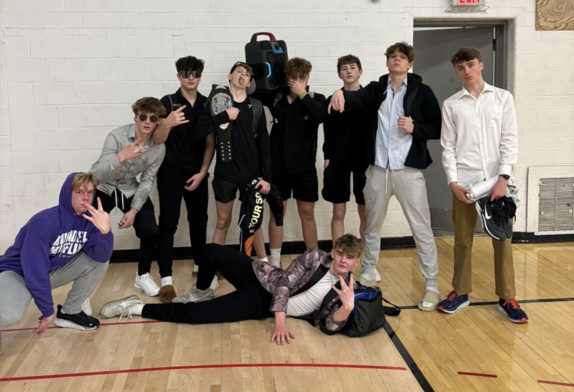 The Wailing Woods Warriors pose after a victory at the John R. Grubb YMCA in Des Moines. The Warriors finished the season 13-0 and won the championship.