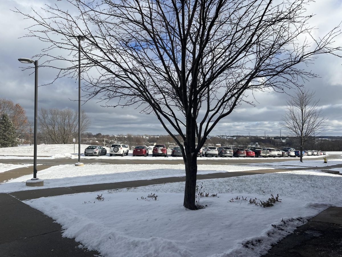 Snow covers the Norwalk High School side parking lot during third period on Monday, Dec. 2. 