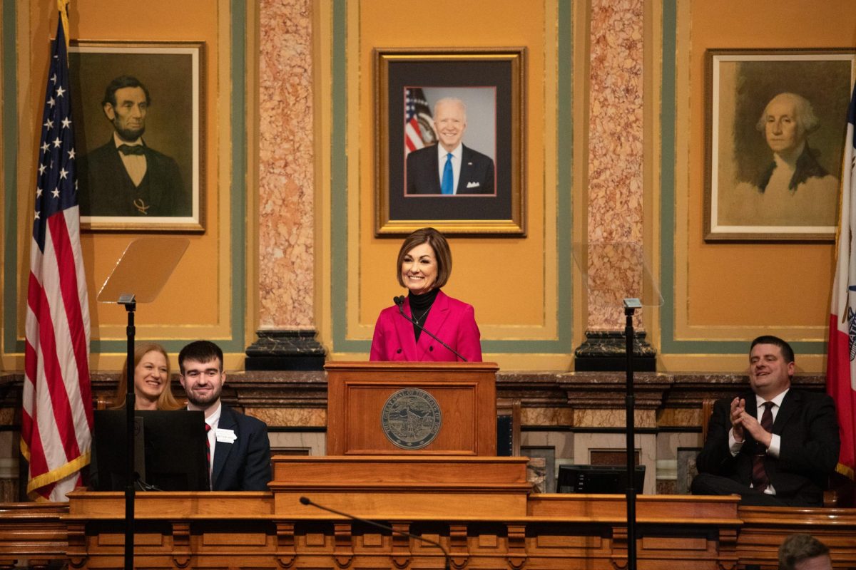 Governor Kim Reynolds stands at the podium during the 2025 Condition of the State. 