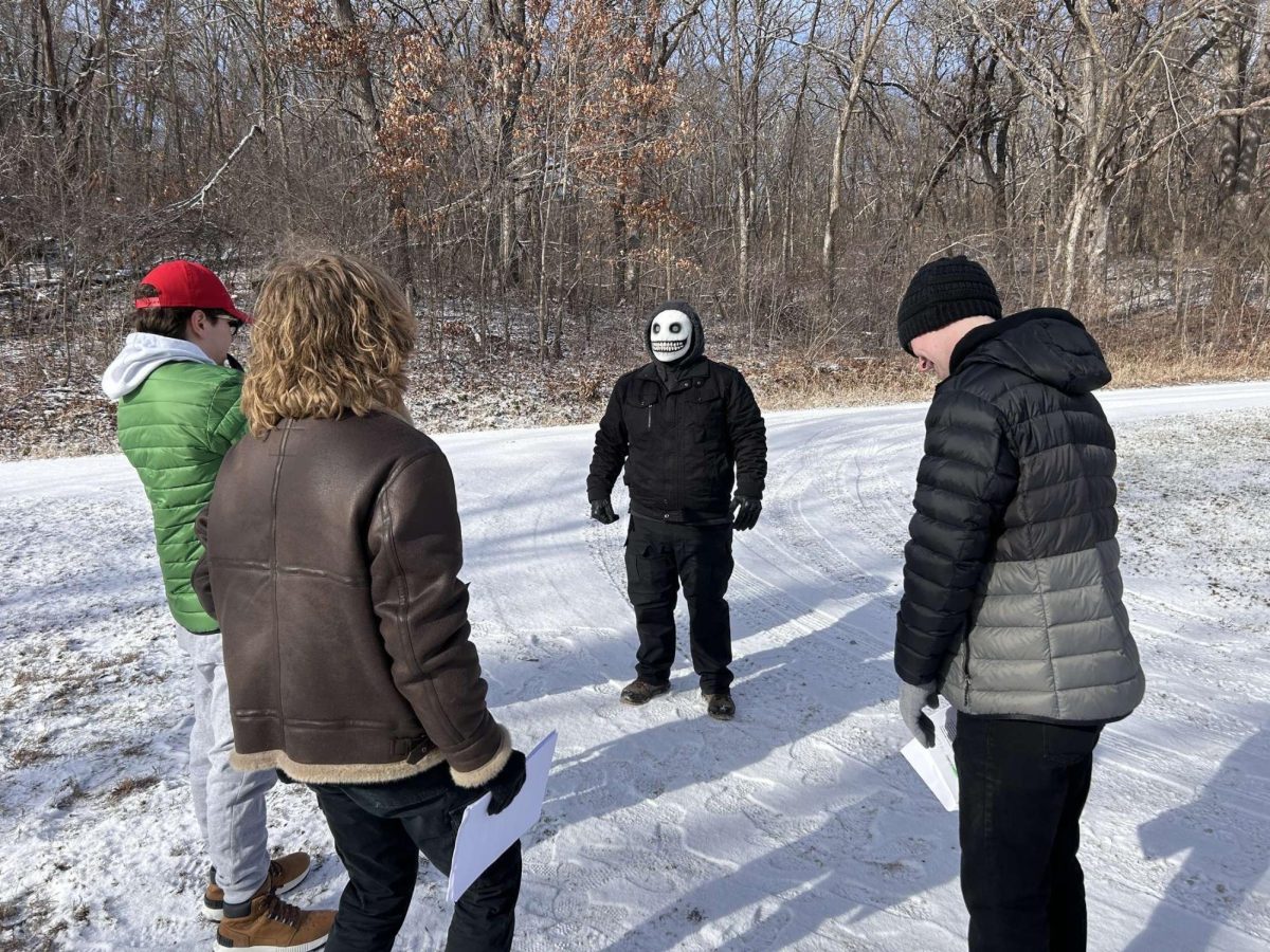 Nate Rodriquez (left) directs Alex Rodriquez (masked) at the filming location for his movie, while Brandon Christiansen and Colin Randolph assist on set.