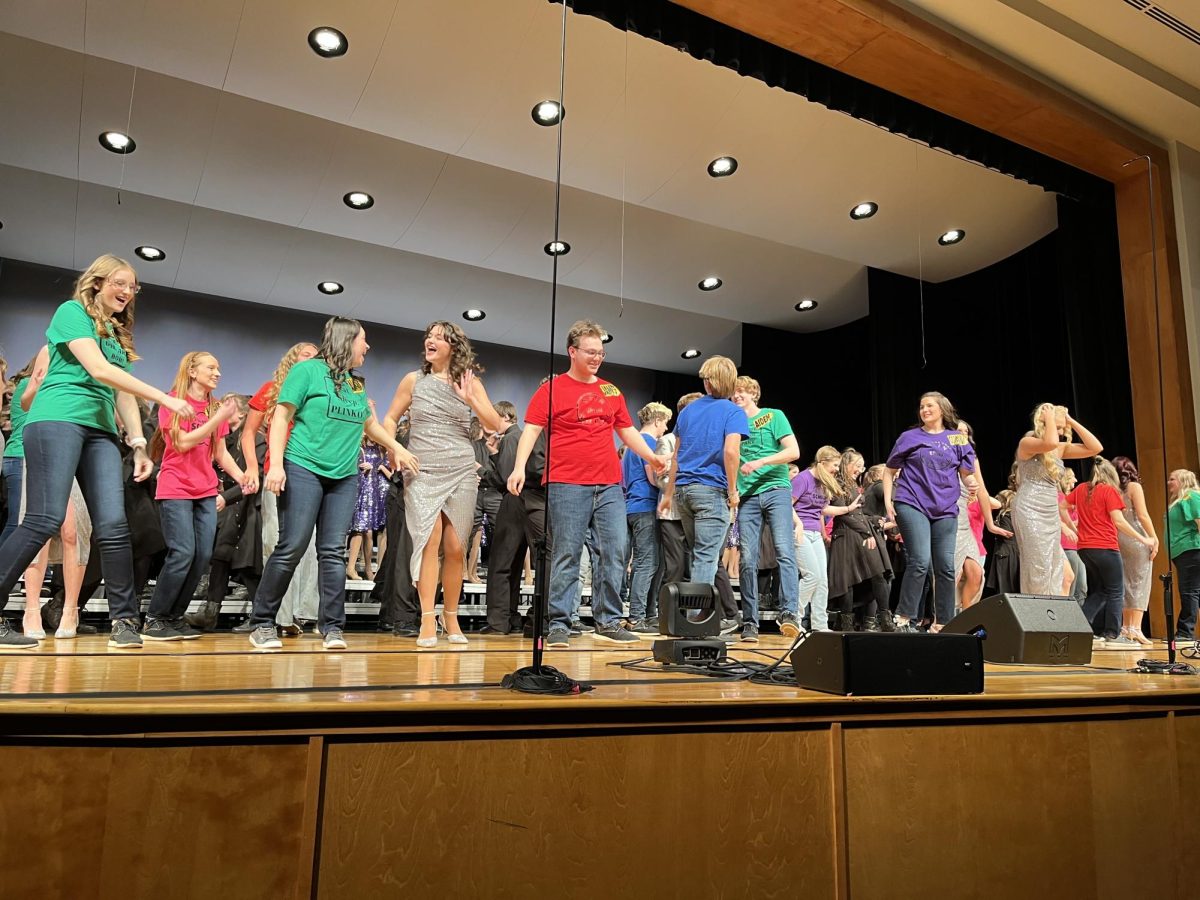 Norwalk seniors featured in the front row during the performance of "No Business Like Show Business" during the show choir showcase on Friday, February 28. This showcase features both the high school and middle school show choirs, as well as a variety of senior solos.