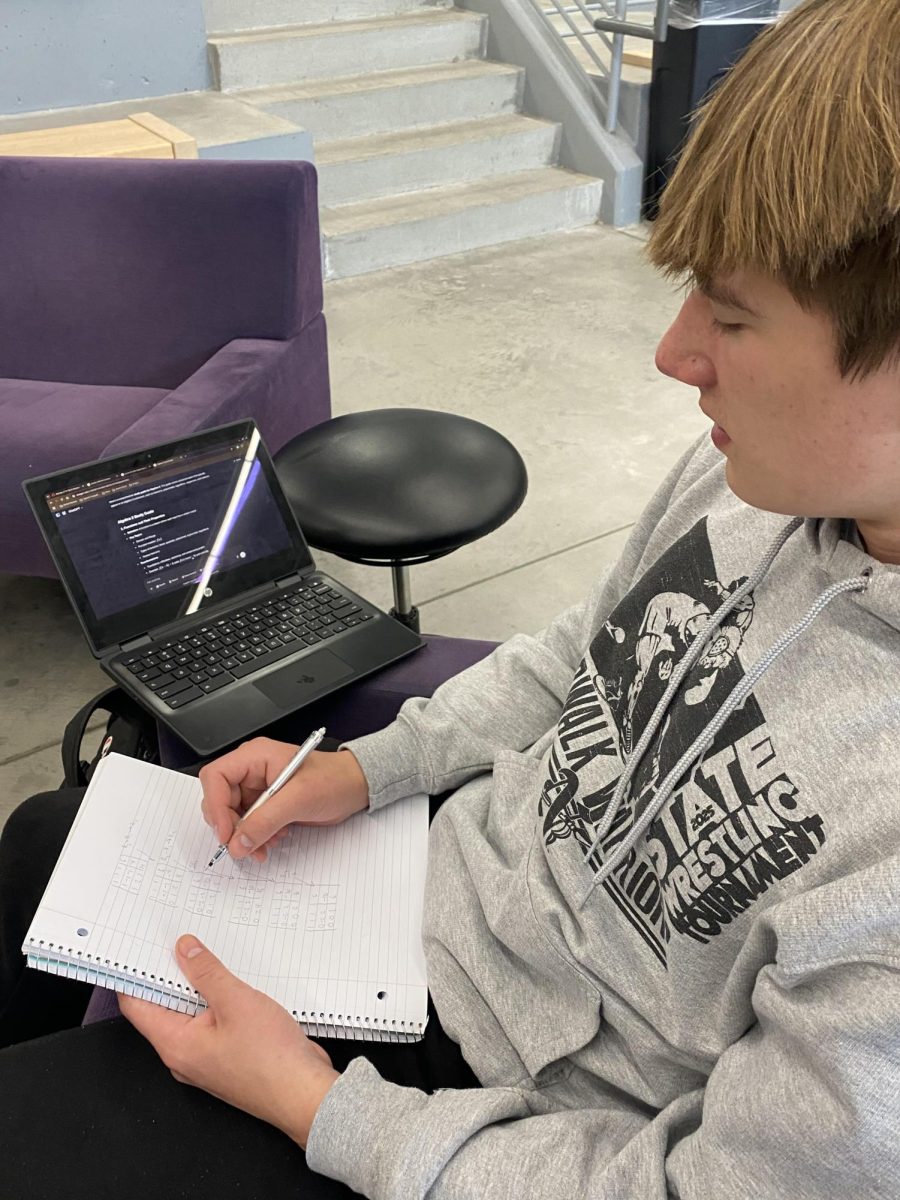 Senior Blake Lee creates study problems with ChatGPT to help him with his Algebra class on May 20 in the Warrior Zone. 