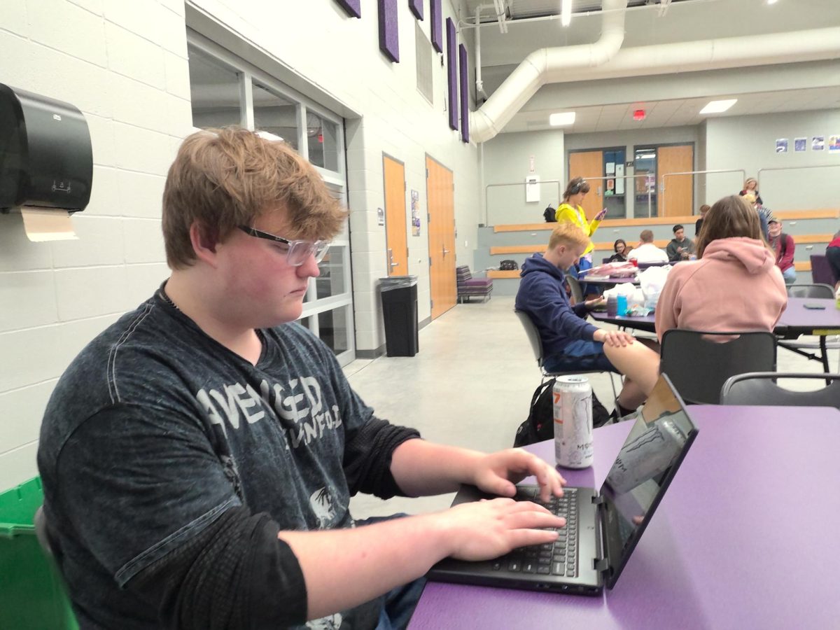 CJ Ray works on a reading assignment for English in the Warrior Zone.