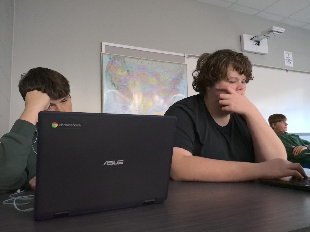 Simon Aagard (left) and Grayson Updegraff work in study hall on Monday, Sept. 8.