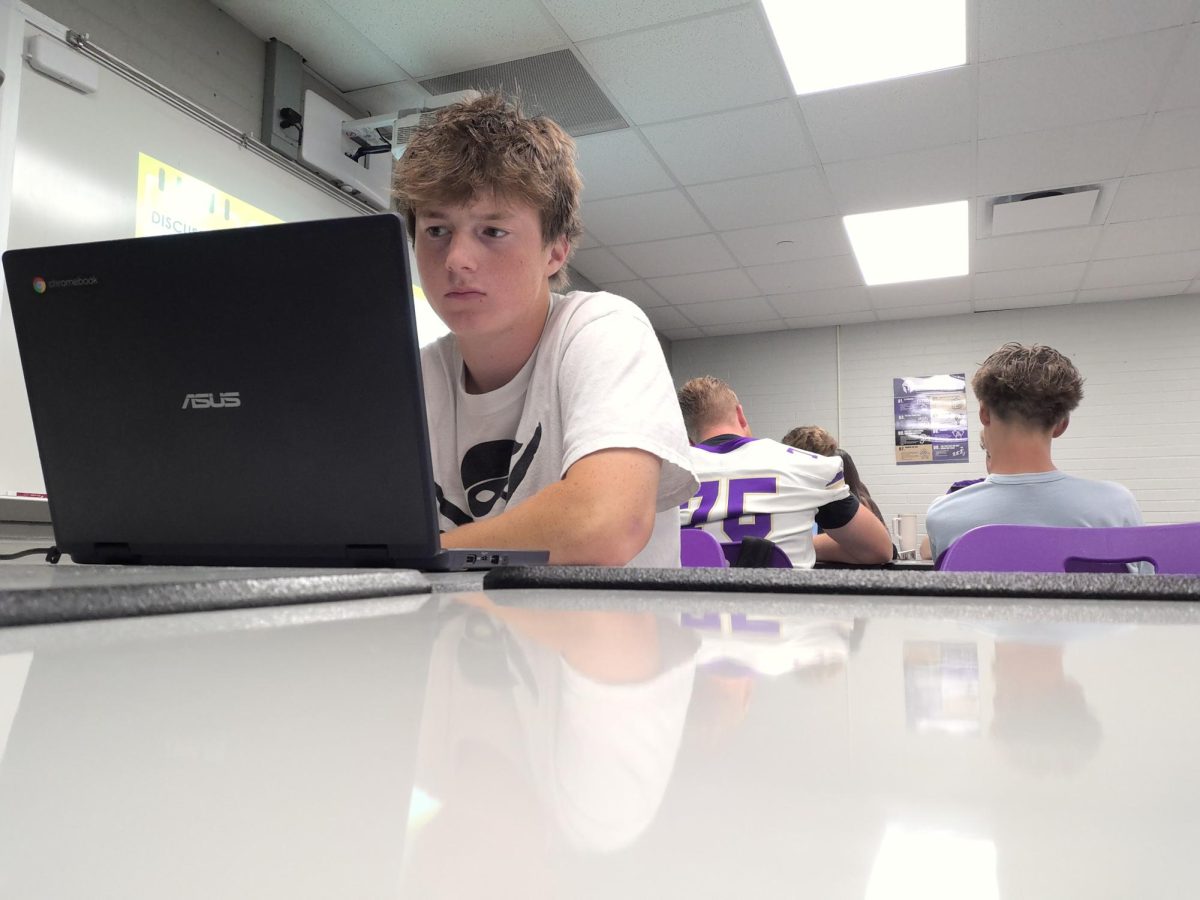 Senior Hudson Ford reads during second hour AP Lit on Friday, Aug. 29. The class book is "Oedipus: A New Version," a classic Greek Mythological piece of literature.