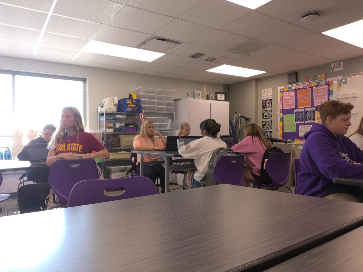 On Tuesday, Sept. 2nd, at 9:20 a.m., students in Ms. Ashbacher's class are finishing up an assignment from Friday. They needed to finish this slideshow, because after 10 minutes, they would have to share their work with the class, and they needed to share what they knew to continue with the day.