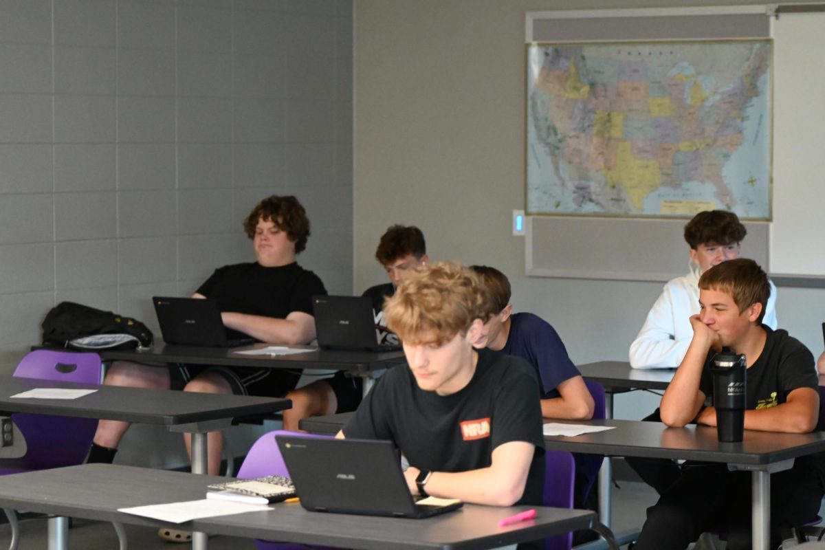Nick Turner plays a game on his Chromebook during study hall. Students in study hall were working, reading, or talking to each other for the entire study hall period until the bell rang.