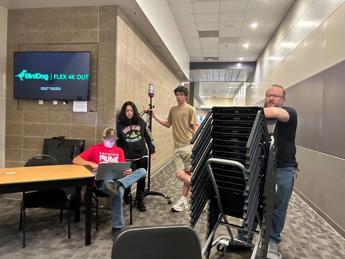 Blackshirts hold their first meeting of the season on Thursday, October 2. Mike Grubb the manager talks to students after the meeting and auditorium tour was coming to a close.
