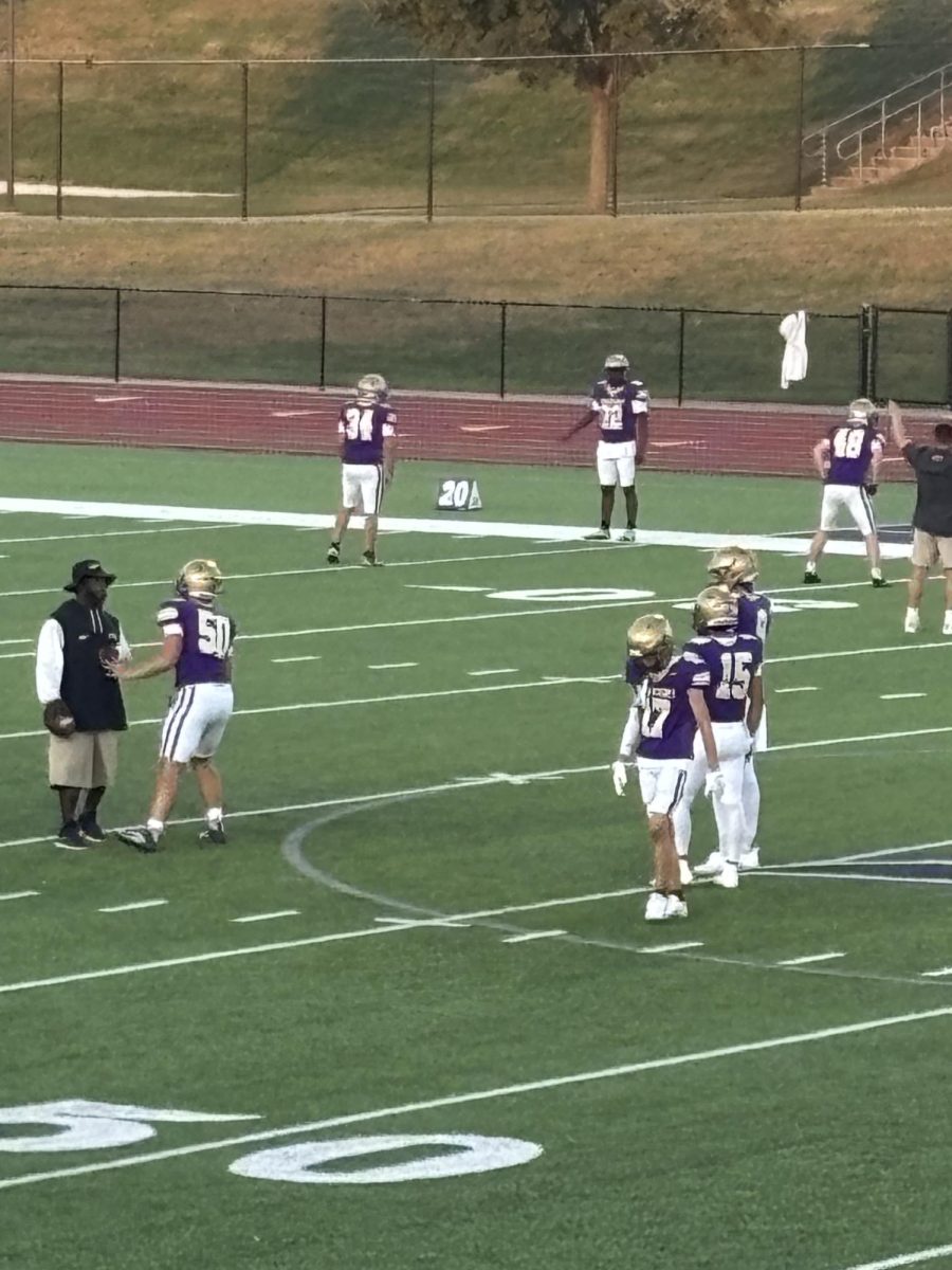 Norwalk’s football team warming up pre-game vs Des Moines East for the Homecoming game
