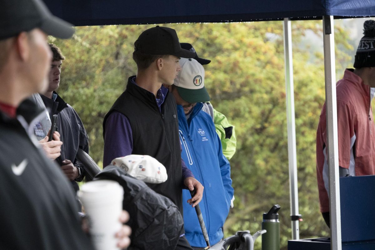 Ian Lux waits to tee off and start his second round of the Boys Golf 4A State Tournament. Lux was the top rated Norwalk golfer all year as a senior. 