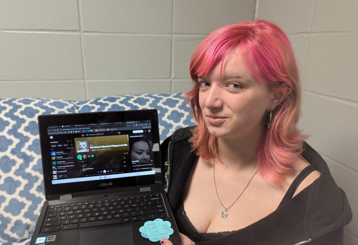 Jessi Gerritson poses for a picture for her recent story review on a musician's newest album coming out.